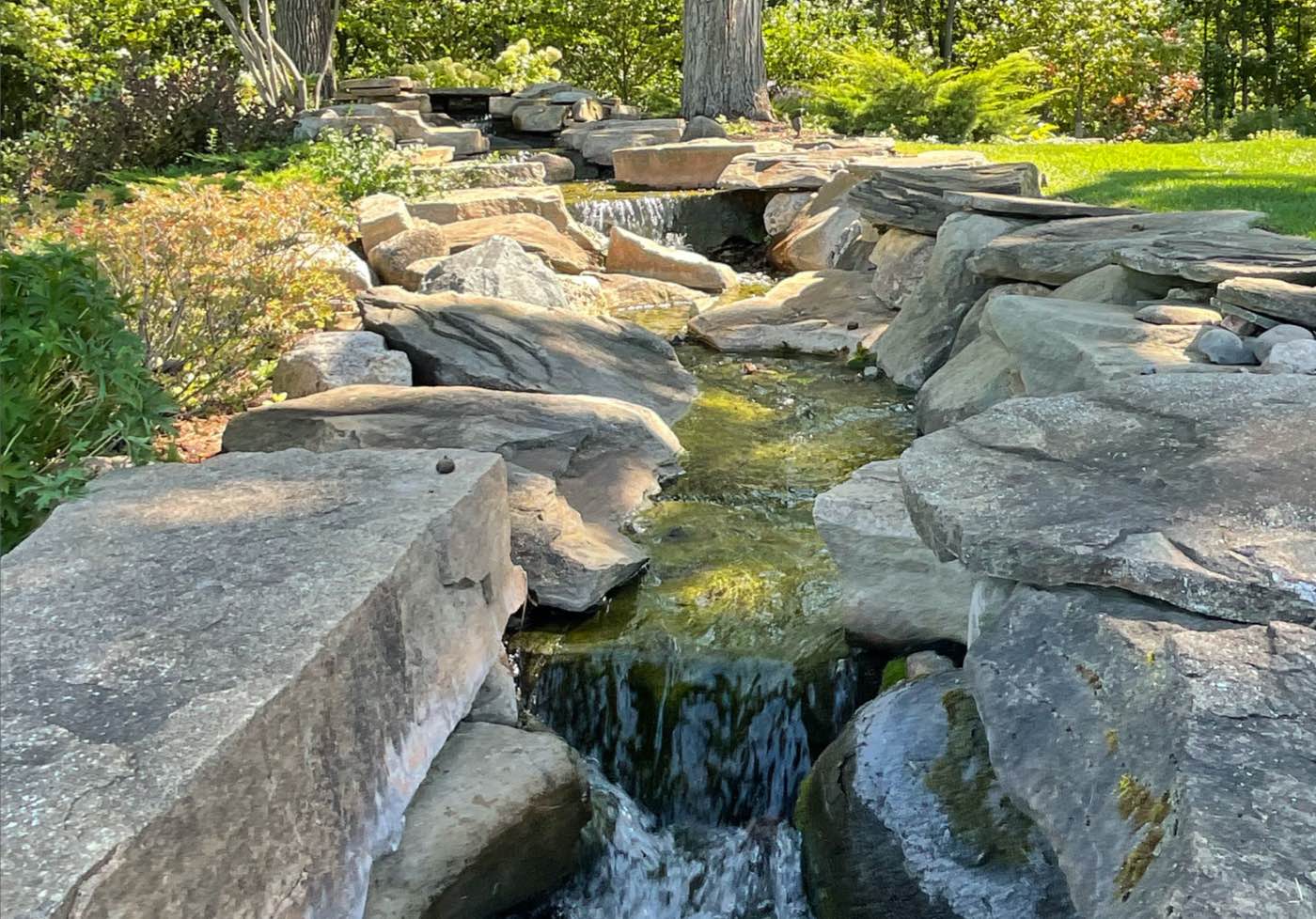 Stone-banked watercourse feature